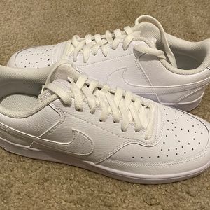 I am selling a pair of wall white Nike court vision lows
